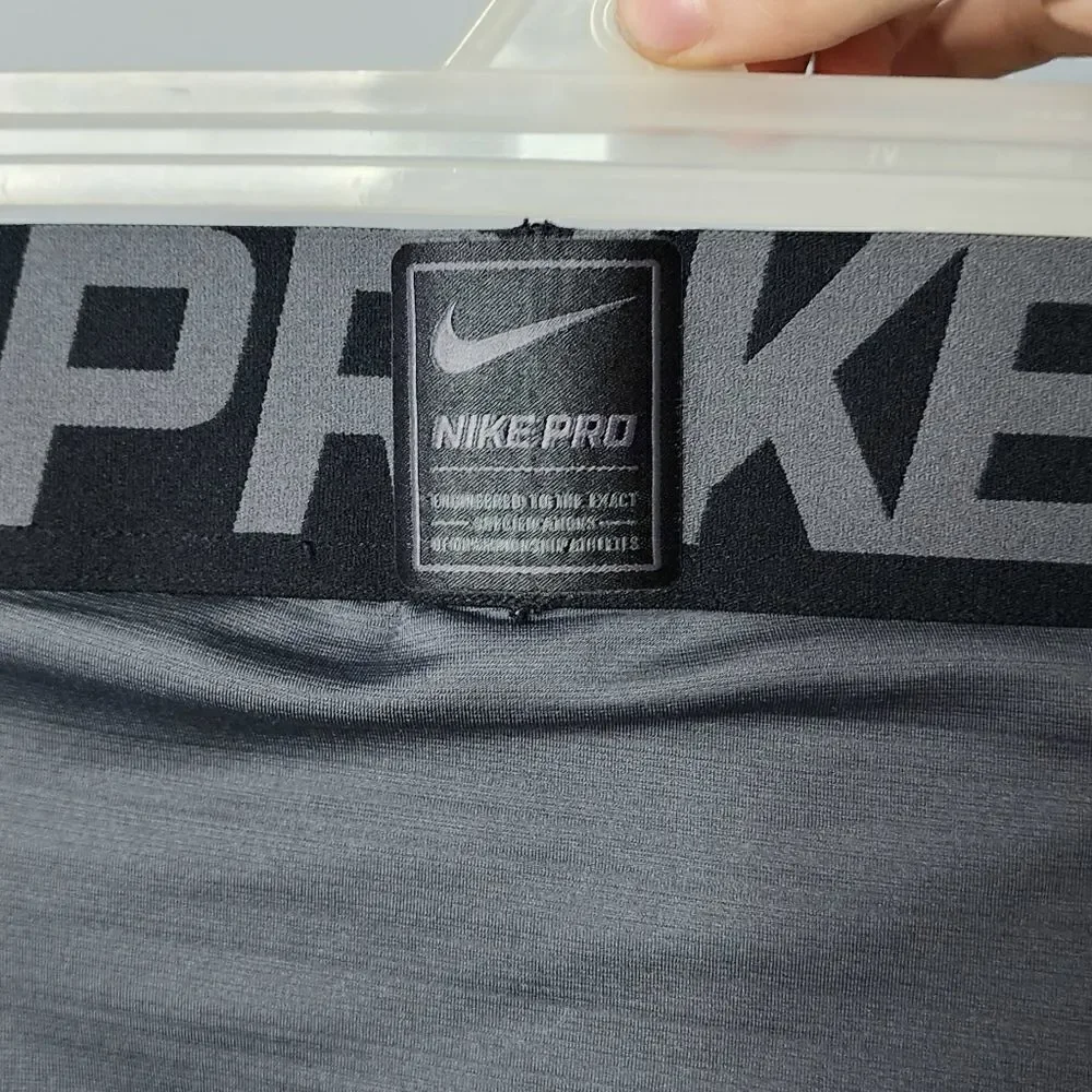 Nike Pro compression pants spell out size medium gray and black